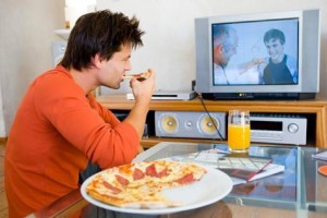 Man tv eating